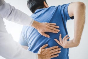 Physical Doctor consulting with patient about Back problems Physical therapy concept for microdiscectomy