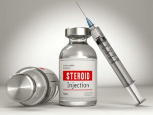 Bottle of Steroid Injection with a Syringe. 3d Render