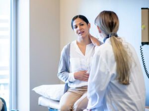 Woman With Neck Pain at the Doctors