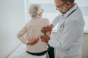 Senior Woman suffering With Spine Pain