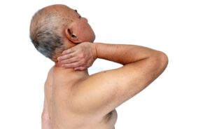 A senior man with neck pain.